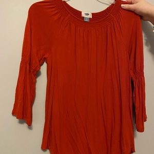Orange/dark orange shirt with 3/4 sleeves